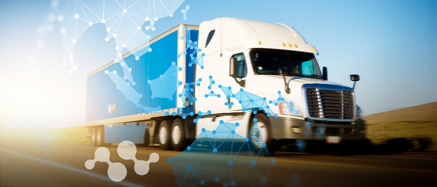 A white semi-truck with blue trailer driving on an open highway, overlaid with blue network and connectivity graphics that suggest IoT or satellite connectivity. The image visually represents connected transportation for the blog "Webinar Recap: Revolutionizing Asset Tracking through Satellite-Based IoT Technologies," showing how modern trucking integrates with advanced tracking technologies for real-time supply chain visibility.
